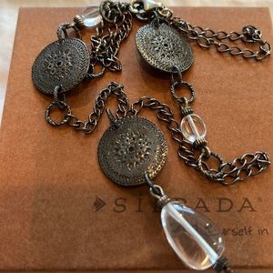 Silpada silver necklace with clear beads.